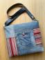 Preview: Aus der ausrangierten Jeans und einem Wunschstoff ist eine GUK-Tasche geworden.