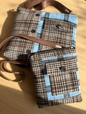 Zwei Taschen aus dem Hemd einer Kundin